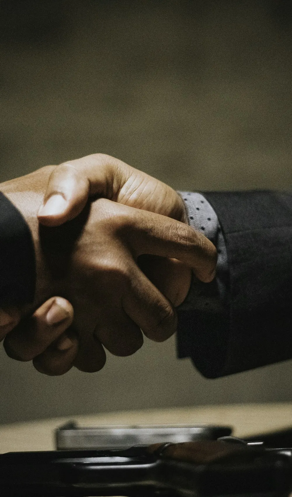Two business partners shaking hands